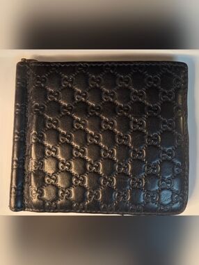 Gucci Black embossed GG Leather Bifold Wallet